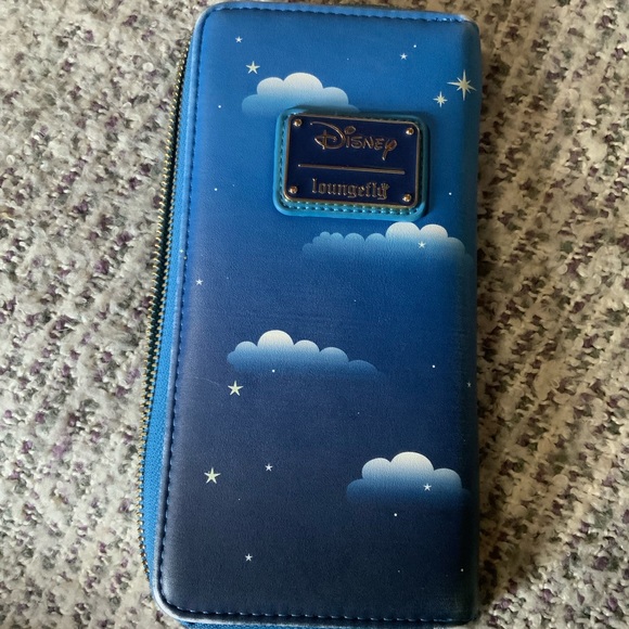 Retired Loungefly GLOW IN THE DARK Peter Pan and friends wallet. GUC - Picture 2 of 12